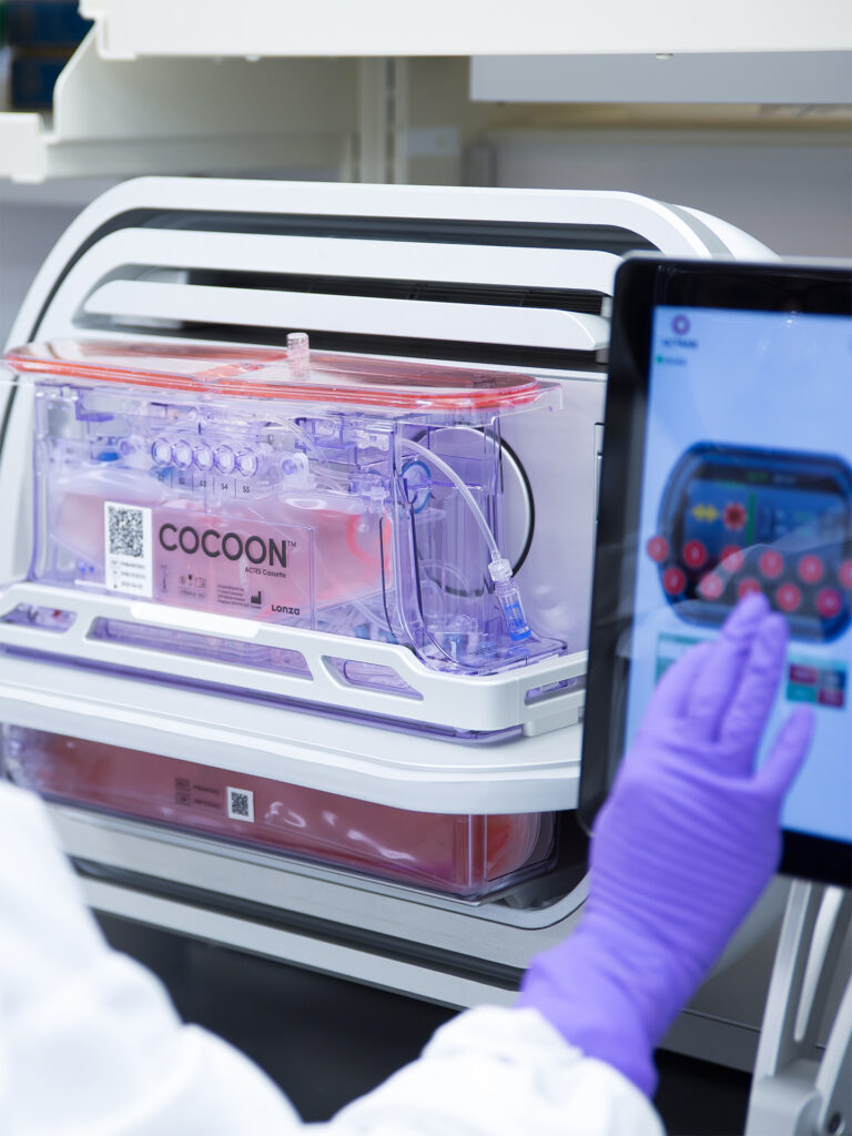 Scientist working with Lonza's Cocoon device